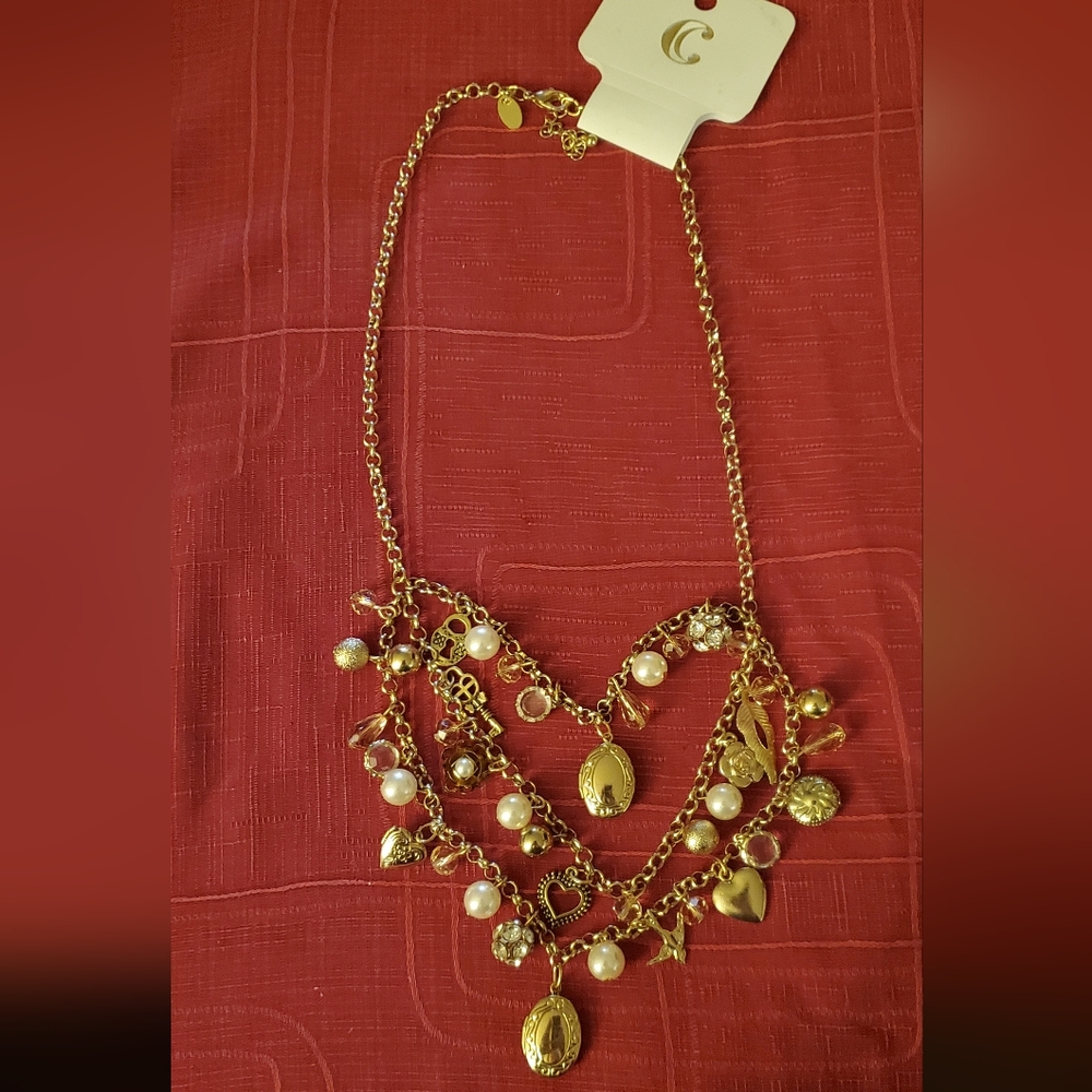 Gold Tone Treasure Charm Necklace